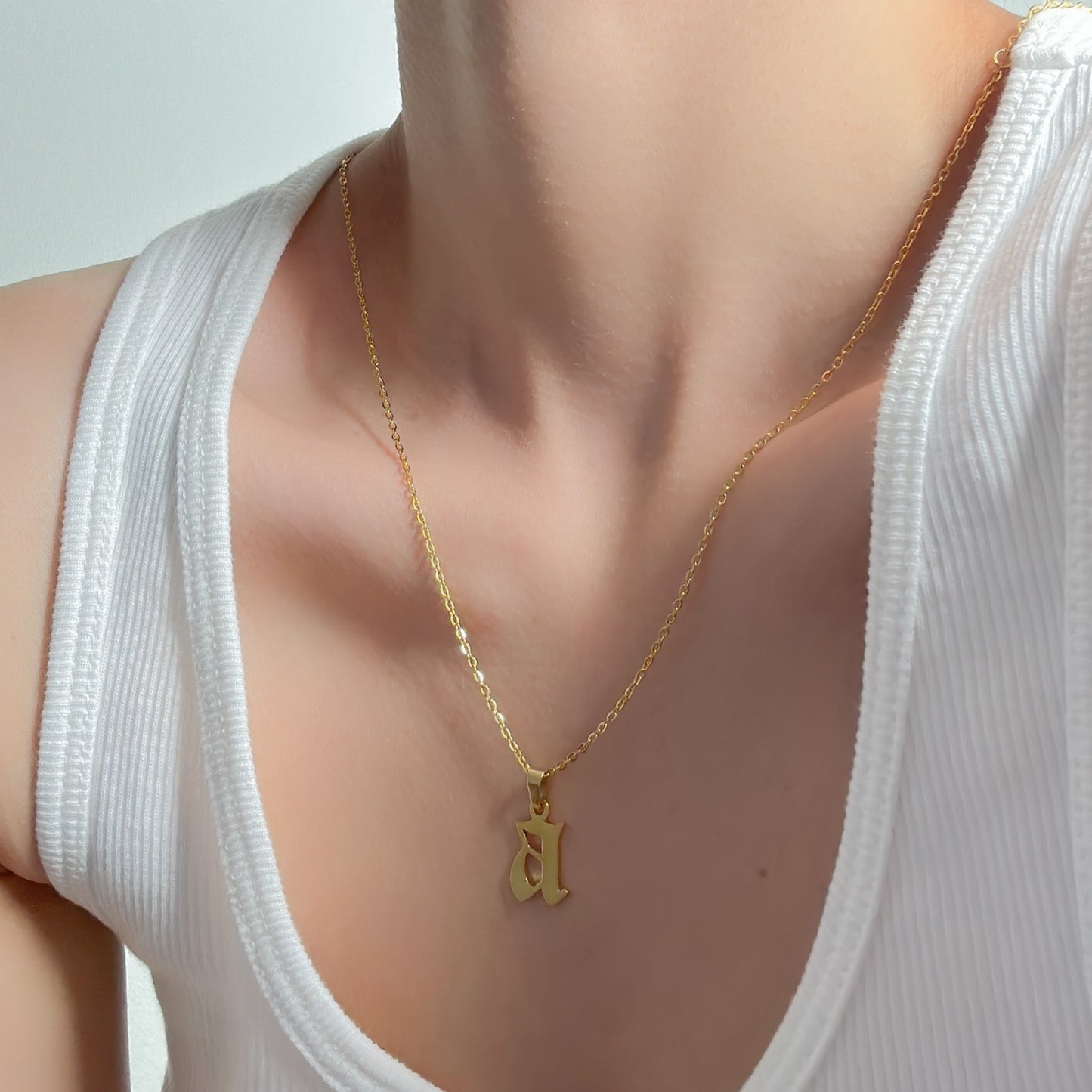 LOWER CASE INITIAL NECKLACE