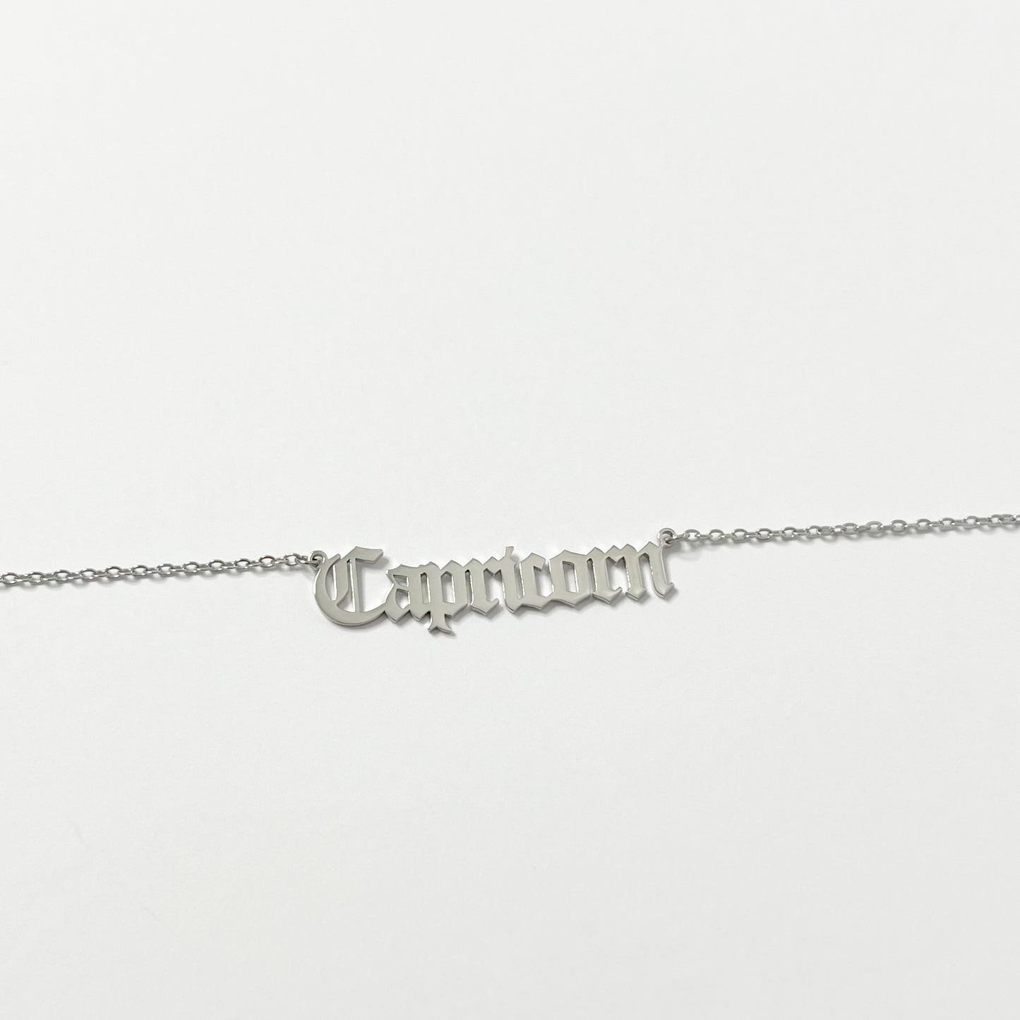 SILVER OLD ENGLISH ZODIAC NECKLACE